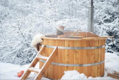 Hot tub in de sneeuw